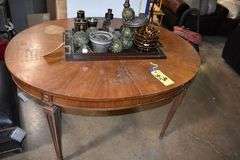 (1) OVAL WOOD TABLE - APPROX. 52" X 43" X 29" AND (1) SERVING TRAY WITH ASSORTED DECOR