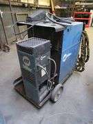 MILLER SYNCROWAVE 250 DX WELDER S/N MC040026L WITH LEADS AND FOOT SWITCH, PORTABLE AND WITH WATERMATE 1A COLLING SYSTEM, W/LEADS & FOOT SWITCH, PORTABLE