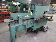 METAL MUNCHER HYDRAULIC IRON WORKER MDL. MM61E18, S/N 7062880, W/FOOT SWITCH CONTROL