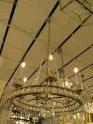 CHANDELIER OR PENDANT AS SHOWN * REFER TO PHOTOS * BUYER RESPONSIBLE FOR REMOVAL - BRING TOOLS AND LADDER AS ITEMS ARE CEILING MOUNTED 12'-14' CEILING HEIGHT*