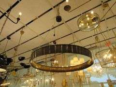 CHANDELIER OR PENDANT AS SHOWN * REFER TO PHOTOS * BUYER RESPONSIBLE FOR REMOVAL - BRING TOOLS AND LADDER AS ITEMS ARE CEILING MOUNTED 12'-14' CEILING HEIGHT*