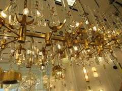 CHANDELIER OR PENDANT AS SHOWN * REFER TO PHOTOS * BUYER RESPONSIBLE FOR REMOVAL - BRING TOOLS AND LADDER AS ITEMS ARE CEILING MOUNTED 12'-14' CEILING HEIGHT*
