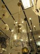 CHANDELIER OR PENDANT AS SHOWN * REFER TO PHOTOS * BUYER RESPONSIBLE FOR REMOVAL - BRING TOOLS AND LADDER AS ITEMS ARE CEILING MOUNTED 12'-14' CEILING HEIGHT*