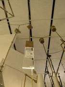 CHANDELIER OR PENDANT AS SHOWN * REFER TO PHOTOS * BUYER RESPONSIBLE FOR REMOVAL - BRING TOOLS AND LADDER AS ITEMS ARE CEILING MOUNTED 12'-14' CEILING HEIGHT*