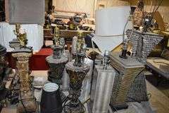 TABLE WITH CONTENTS INCLUDING ASSORTED LAMPS AND LAMPSHADES *SOME DAMAGED*