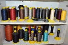 CABINET OF ASSORTED SEWING THREADS AS SHOWN