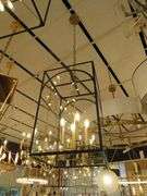 CHANDELIER OR PENDANT AS SHOWN * REFER TO PHOTOS * BUYER RESPONSIBLE FOR REMOVAL - BRING TOOLS AND LADDER AS ITEMS ARE CEILING MOUNTED 12'-14' CEILING HEIGHT*