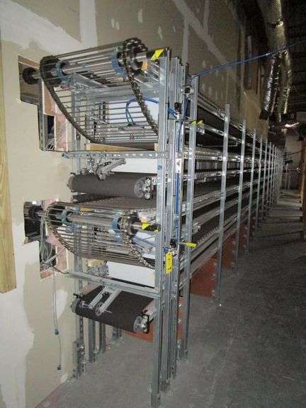 BRYANT 4-TIER TELESCOPER AIR FORM MOTORIZED BELT CONVEYOR APPROX. 55' LONG WITH APPROX. 18" XD 400' OF BELT CONVEYOR, WITH (6) MOTORS AND (2) CONTROL PANEL CABINETS