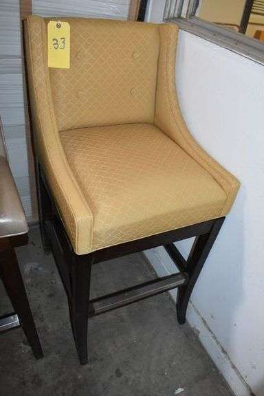 UPHOLSTERED SWIVELING BAR STOOL