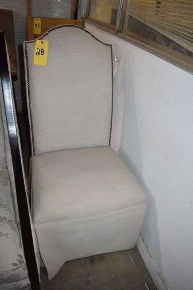 UPHOLSTERED SKIRTED CHAIR WITH NAIL HEAD DÉCOR