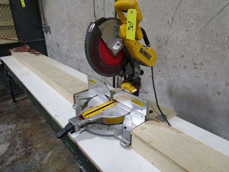 DEWALT 12" DOUBLE BEVEL COMPOUND MITRE SAW MDL. DWS716, W/METAL/WOOD SHOP MADE BENCH