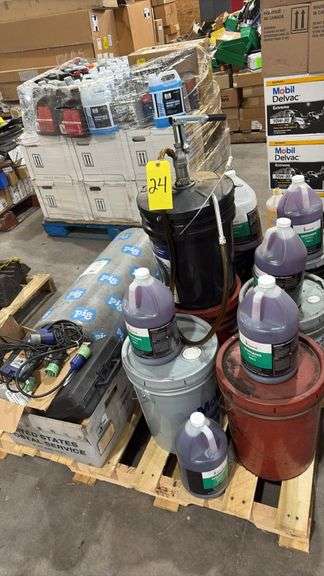 Pallet with degreaser, assorted lubricants, absorbent mat and test equipment as shown