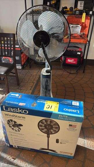 (1) 18" Pedestal Mist Fan, model CE134, (1) Lasco Wind Storm 18" Pedestal fan, operational status unknown.