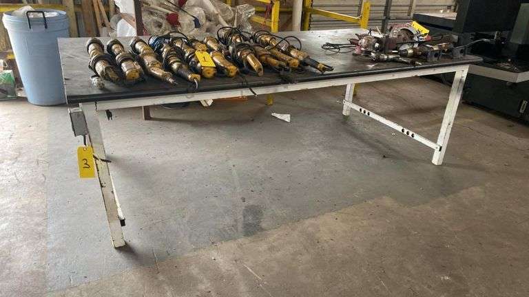 Empty Metal framed table with wood top, 48”x 8’