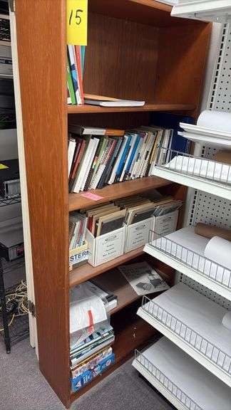 Wood laminate bookshelf, approximately 30“ x 11“ x 60“, sold with contents as shown
