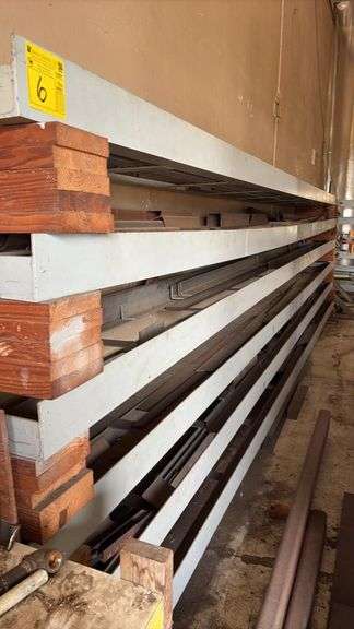 Shop made steel rack with assorted flat, steel cube, steel tube steel, approximately 22’ x 22” x 74”t