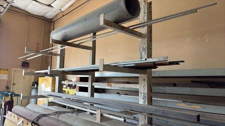 STEEL RACK WITH ASSORTED TUBED, ROUND AND FLAT STEEL AS SHOWN, approximately 11’ x 43” x 10”t