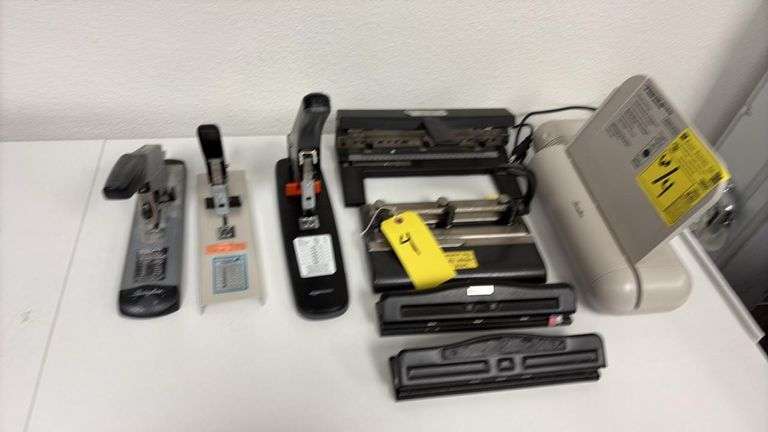 Lot of assorted whole punches and staples as shown