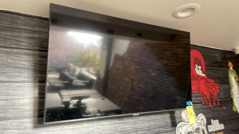 50-Inch LED Flat-Screen TV, Wall Mounted, 4K UHD, Smart TV Capable