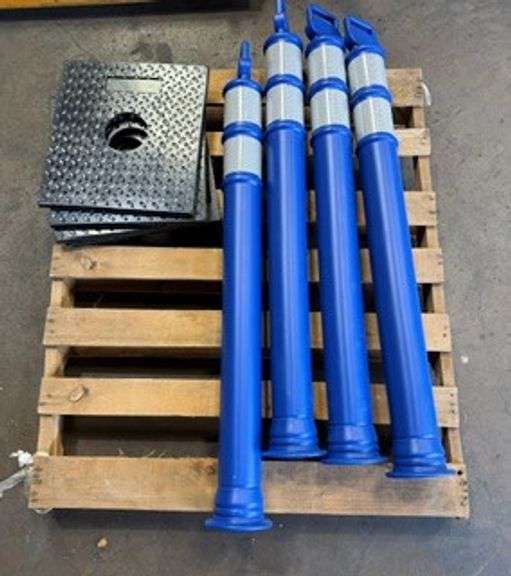 blue traffic style cones with reflective stripes, approximately 4’ height