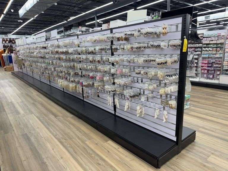 U-Shaped Display - Includes (18) Sections of (EMPTY) Metal Dual Sided Slotted Display Racking w/ Clips. Each Section Measures Approximately 47” X 36” X 65” and Connected Slotted Dual Sided Wall. Delayed Pick Up Required.