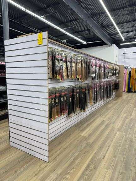 (1) Row Dual Sided Slot Wall Display. Measures Approximately 20’ X 2’8” X 5’6”