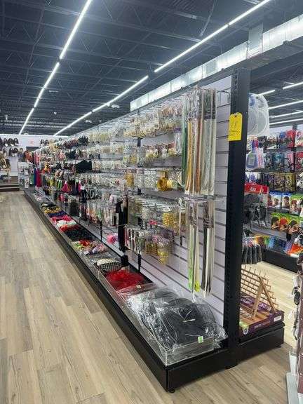 (27) Sections of (Empty) Metal Dual Sided Slotted Wall Displays w/ Metal Hanging Clips. Delayed Pick Up Required.