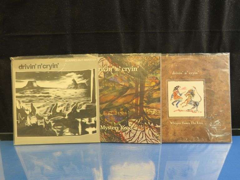 Drivin N Cryin Island Years Collection – Scarred But Smarter, Mystery Road & Whisper Tames The Lion