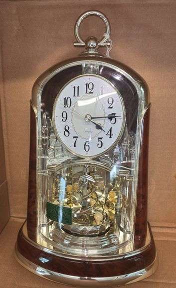 RHYTHM Woodgrain Spiral Pendulum Clock