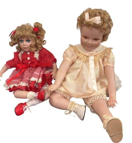 Pair of Porcelain Dolls