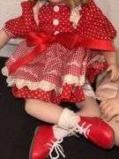 Pair of Porcelain Dolls