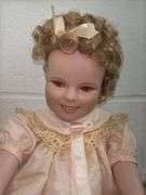 Pair of Porcelain Dolls
