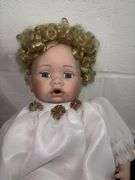 Trio of Collectible Porcelain Dolls