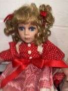 Pair of Porcelain Dolls