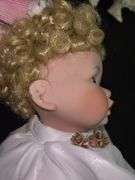 Trio of Collectible Porcelain Dolls