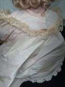 Pair of Porcelain Dolls