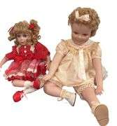 Pair of Porcelain Dolls