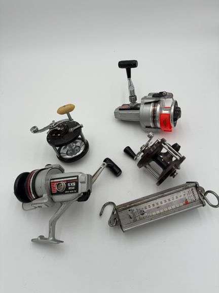 Assortment of Fishing Reels and Line