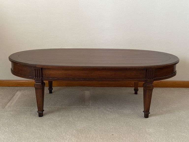 Oval Wooden Coffee Table with Carved Legs
