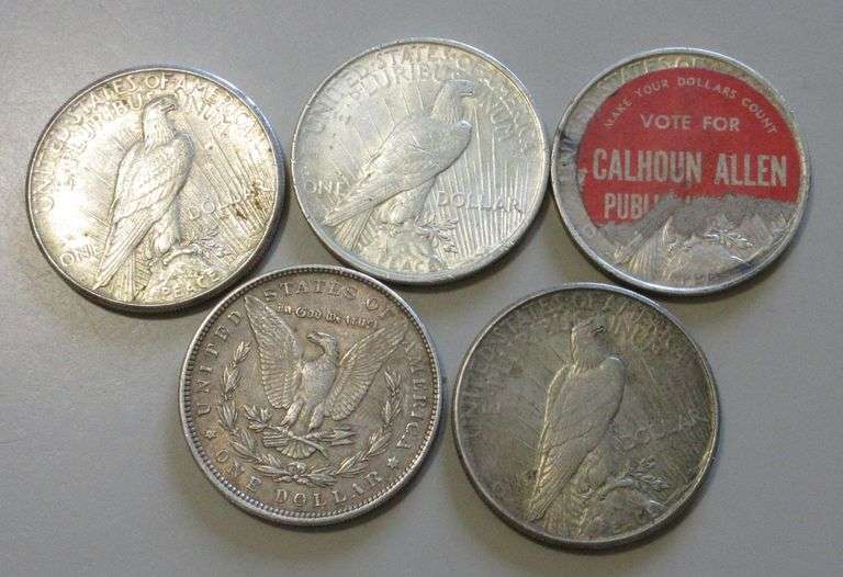 4 PEACE DOLLARS AND $1 MORGAN POLITICAL STICKER ON BACK OF 1