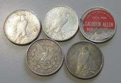 4 PEACE DOLLARS AND $1 MORGAN POLITICAL STICKER ON BACK OF 1