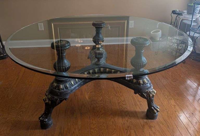 Round Pedestal Dining table with glass top, 61.5" diameter, 29.5" tall(located in dining room)