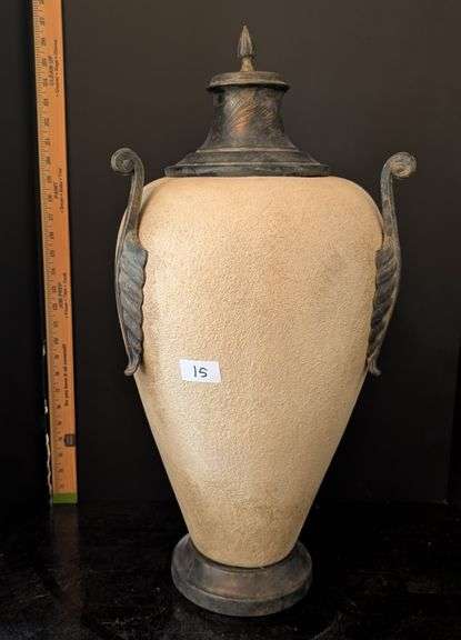 Decorative urn with lid (located in living room)