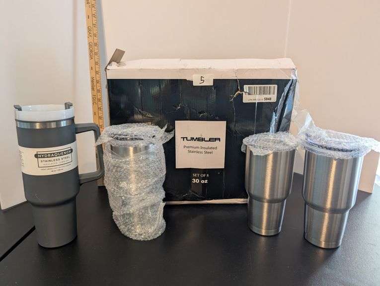 Set of 8, 30 oz stainless steel tumblers and 1, 40 oz with handle (upstairs master bedroom)