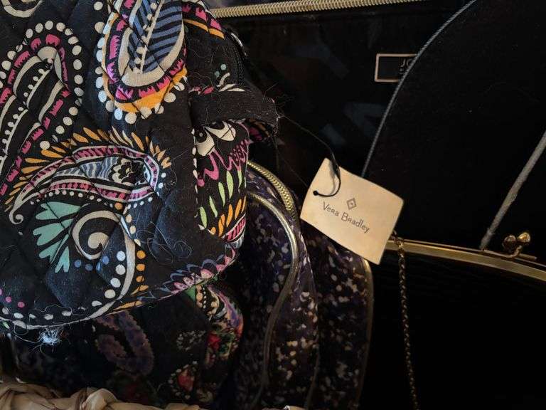Basket of Cosmetics Bags, Purses, Packing Cubes (Vera Bradley, etc. Located in Living room)
