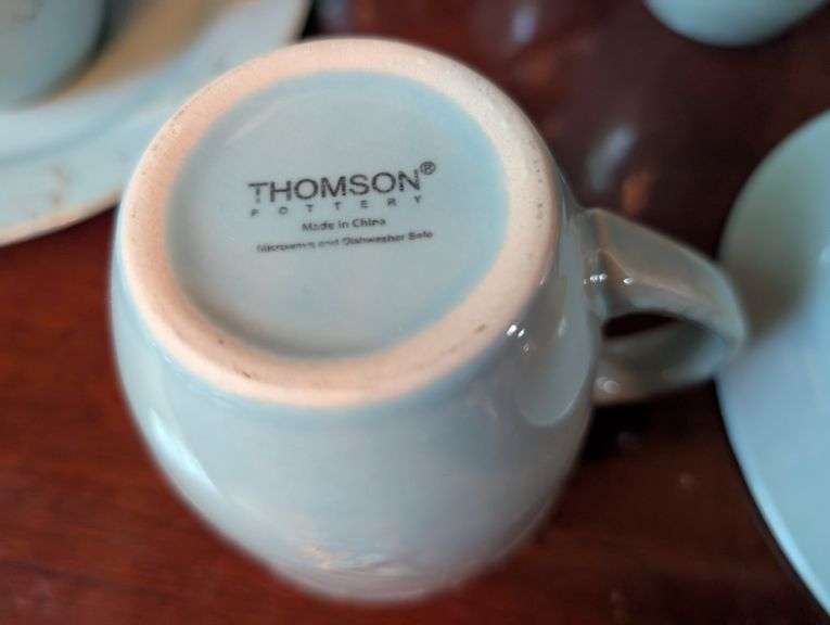 16 pc. Thomson pottery coffee cups and plates(located in dining room)