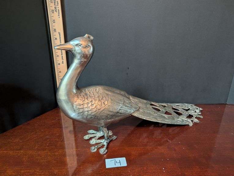 Metal peacock (located in ds back bedroom)