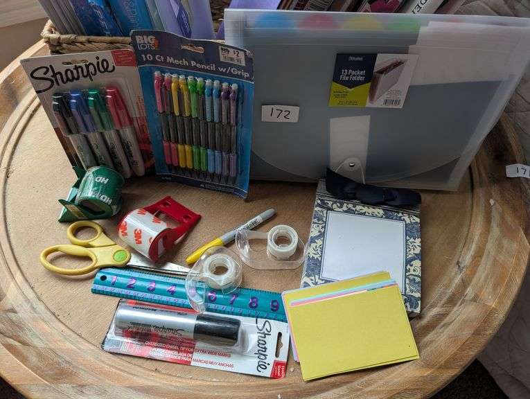 Basket of office supplies(located in DS front bedroom)
