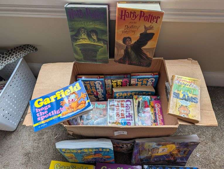 Box full of Garfield books and some Harry Potter(located in front bedroom)