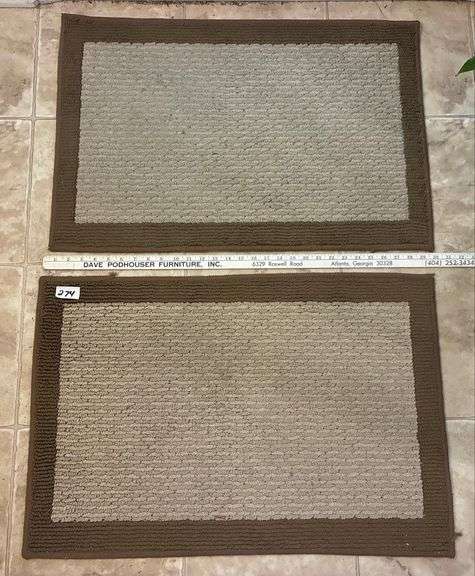 2 pc Brown and Tan Rugs (Located Kitchen)